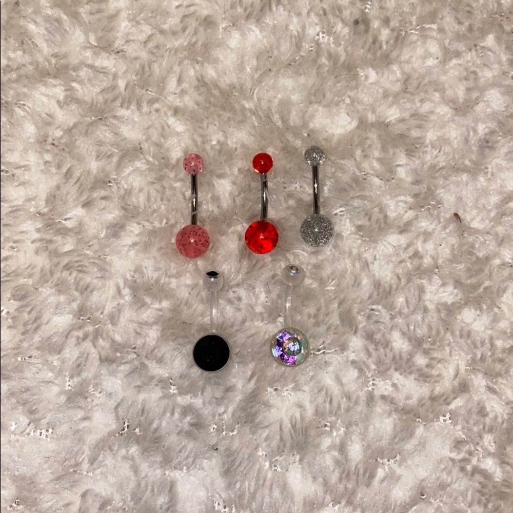 NEVER USED BELLY RINGS